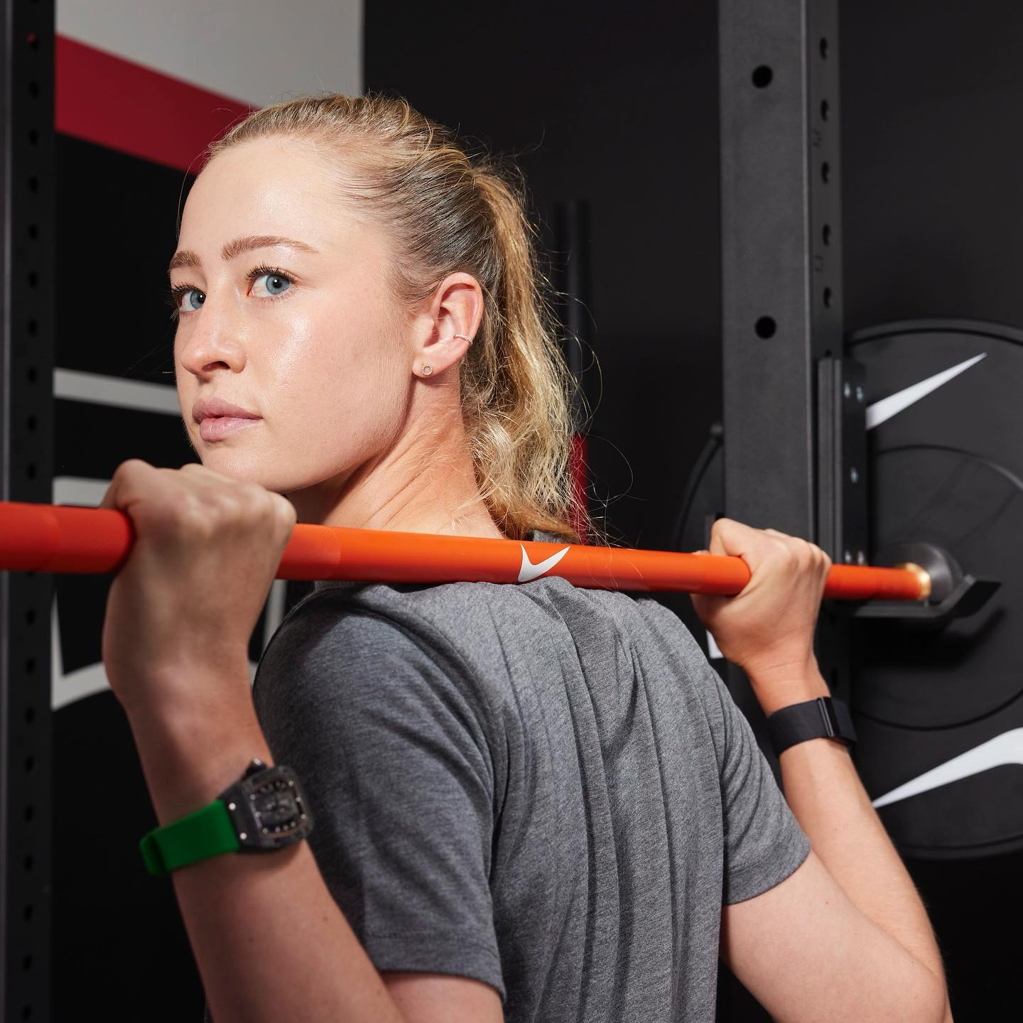 Nike Strength Coated Premium Langhantel - 20 kg / Oranger Swoosh