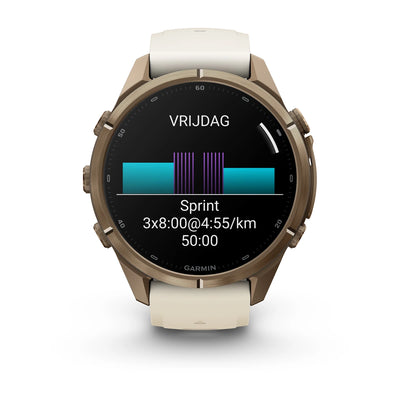 Garmin fēnix® 9 Pro (43 mm) – Autumn Gold Titanium mit cremefarbenem/french-grauem Silikonarmband