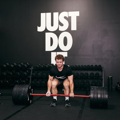 Nike Strength Coated Premium Langhantel – 20 kg / Roter Swoosh 