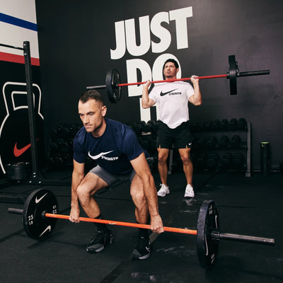 Nike Strength Coated Premium Langhantel - 20 kg / Oranger Swoosh 